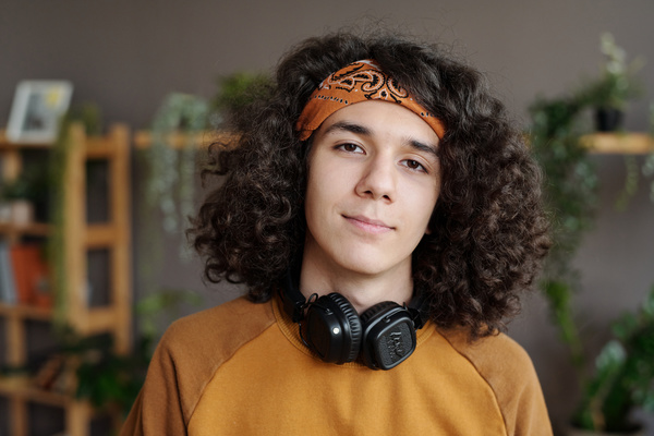 Young Man with Curly Hair